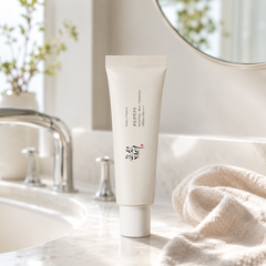 ELUNEA Rice Sun Cream SPF50+ — detalle del envase de 50 ml con etiqueta ELUNEA RITUALS