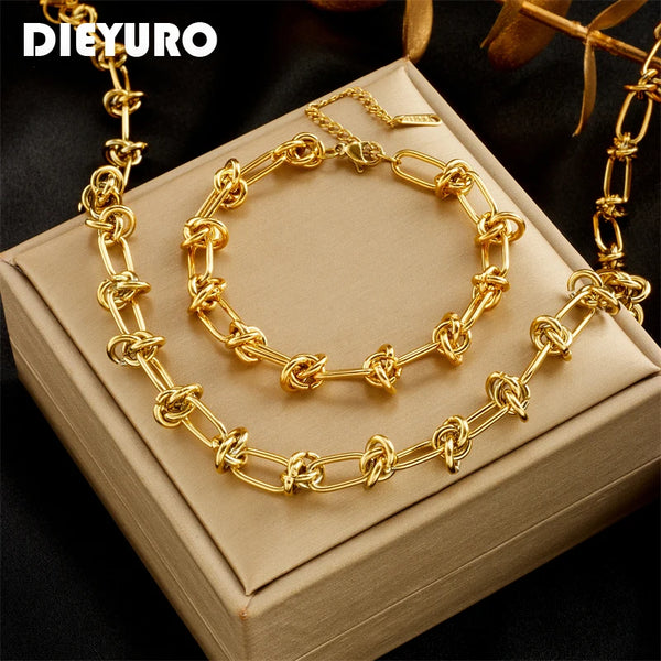 Set Noa — collar y pulsera de nudo dorado en acero 316L, vista principal